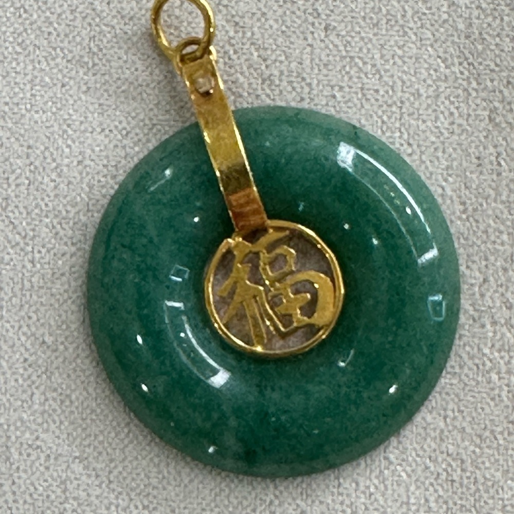 Elegant Green Jade Pendant with 14k Gold Accents